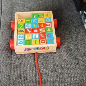 Wooden Pull Toy with Red Wheels